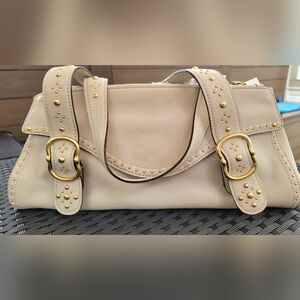Elegant Cream Leather Handbag with Gold Accents